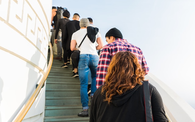 A group of people waiting in line.