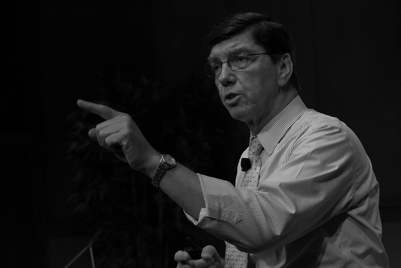 Clayton Christensen is giving a speech.